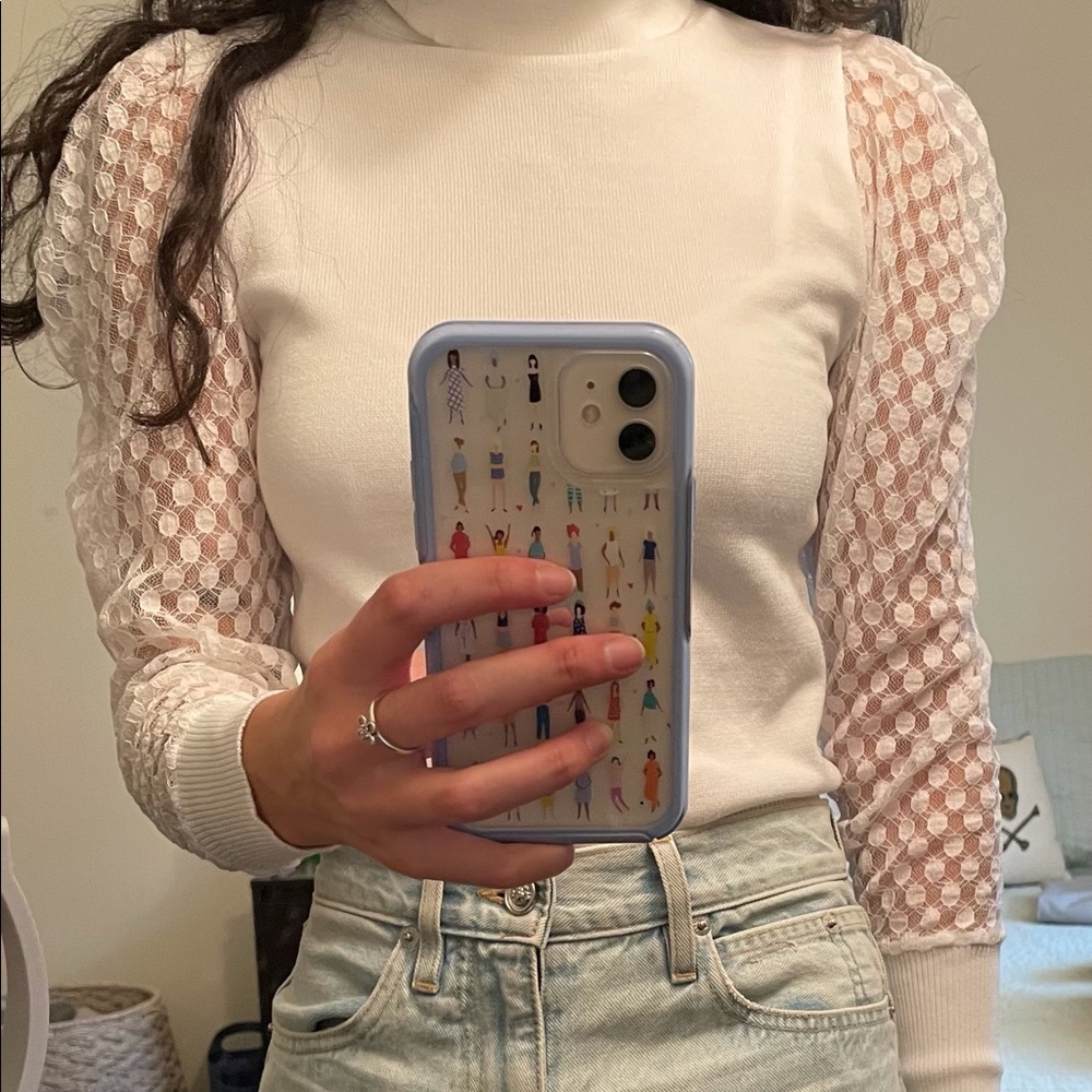 White turtleneck with mesh sleeves